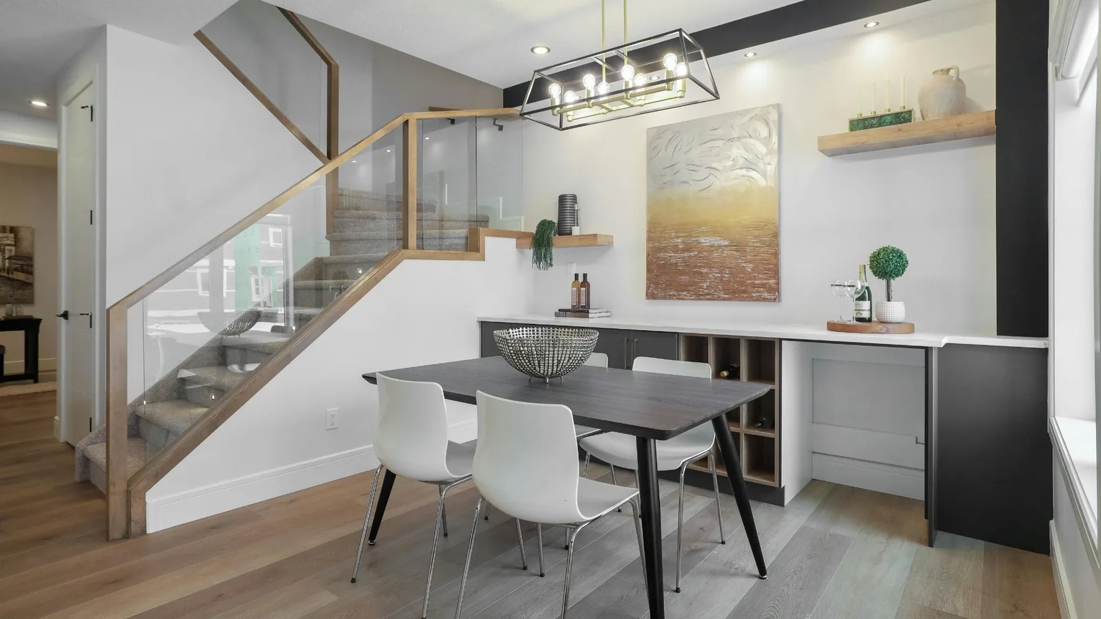 Clean dining area near staircase